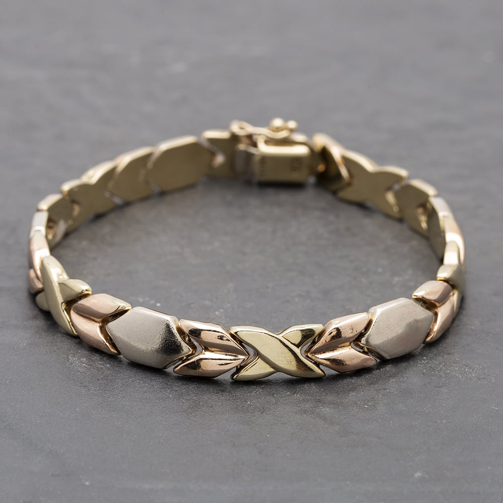 Product photograph of Pre-owned 9ct Three Colour Gold Fancy Pattern Flat 7 5 Inch Chain Bracelet 41281335 from The Jewel Hut