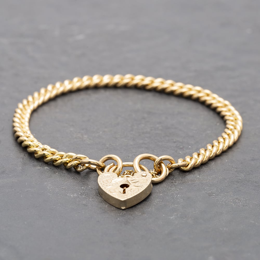 Product photograph of Pre-owned 9ct Yellow Gold Padlock Clasp 7 5 Inch Curb Chain Bracelet 41281338 from The Jewel Hut