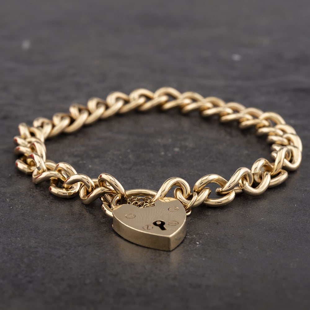 Product photograph of Pre-owned 9ct Yellow Gold Including Padlock 7 Inch Curb Bracelet 41281363 from The Jewel Hut