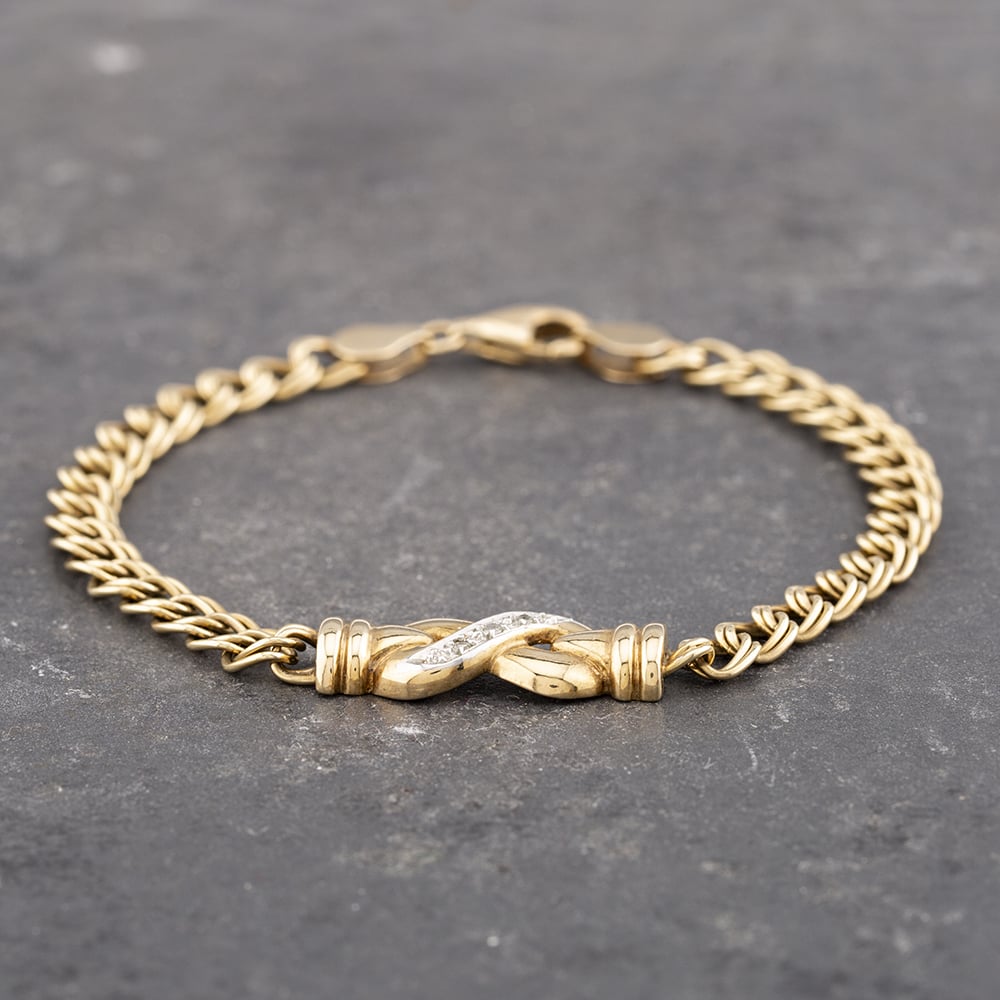Product photograph of Pre-owned 9ct Two Colour Gold Diamond Infinity 7 25 Inch Curb Chain Bracelet 41281382 from The Jewel Hut