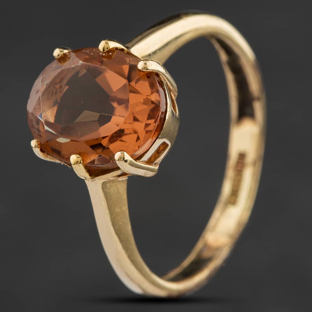 Product photograph of Pre-owned 14ct Yellow Gold Colour Changing Glass Oval Solitaire 4129385 from The Jewel Hut