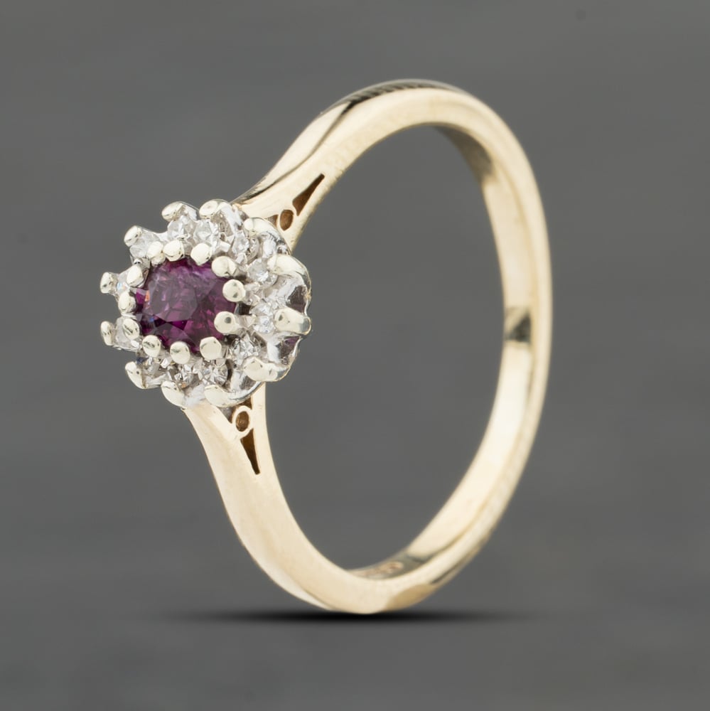 Click to view product details and reviews for Pre Owned 9ct Yellow Gold Ruby And 012ct Diamond Oval Cluster Ring 413302157965.