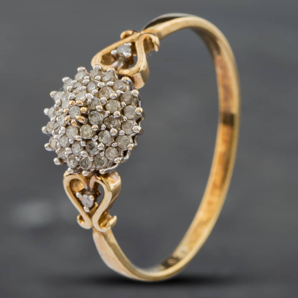 Product photograph of Pre-owned 9ct Yellow Gold 0 25ct Diamond Round Cluster Ring 41381526 from The Jewel Hut