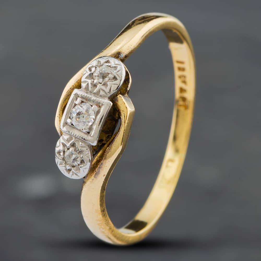 Product photograph of Pre-owned Vintage Yellow Gold Diamond Crossover Three Stone Ring 41381537 from The Jewel Hut