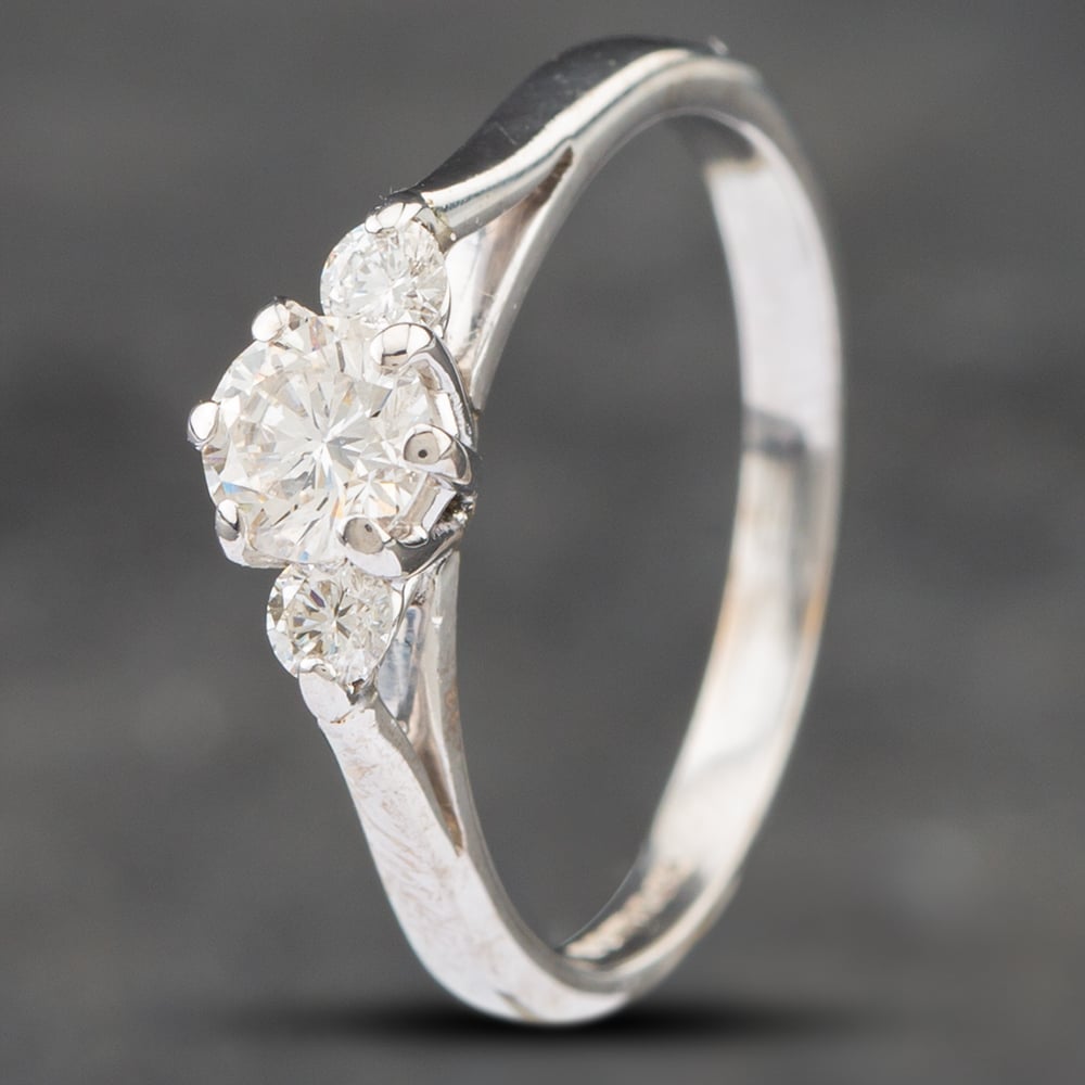 Product photograph of Pre-owned 18ct White Gold Brilliant Cut Diamond Three Stone Ring 41381606 from The Jewel Hut