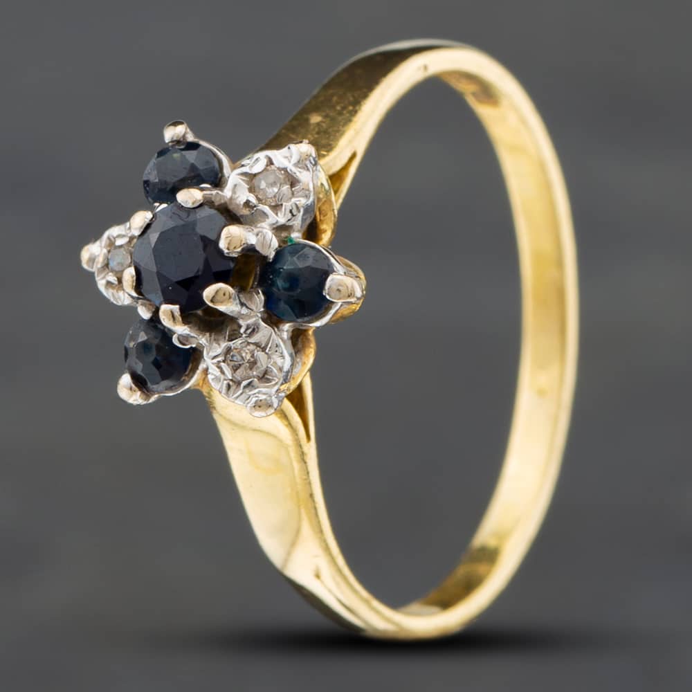 Product photograph of Pre-owned 18ct Yellow Gold Sapphire Amp Single Cut Diamond Cluster Ring 41381678 from The Jewel Hut