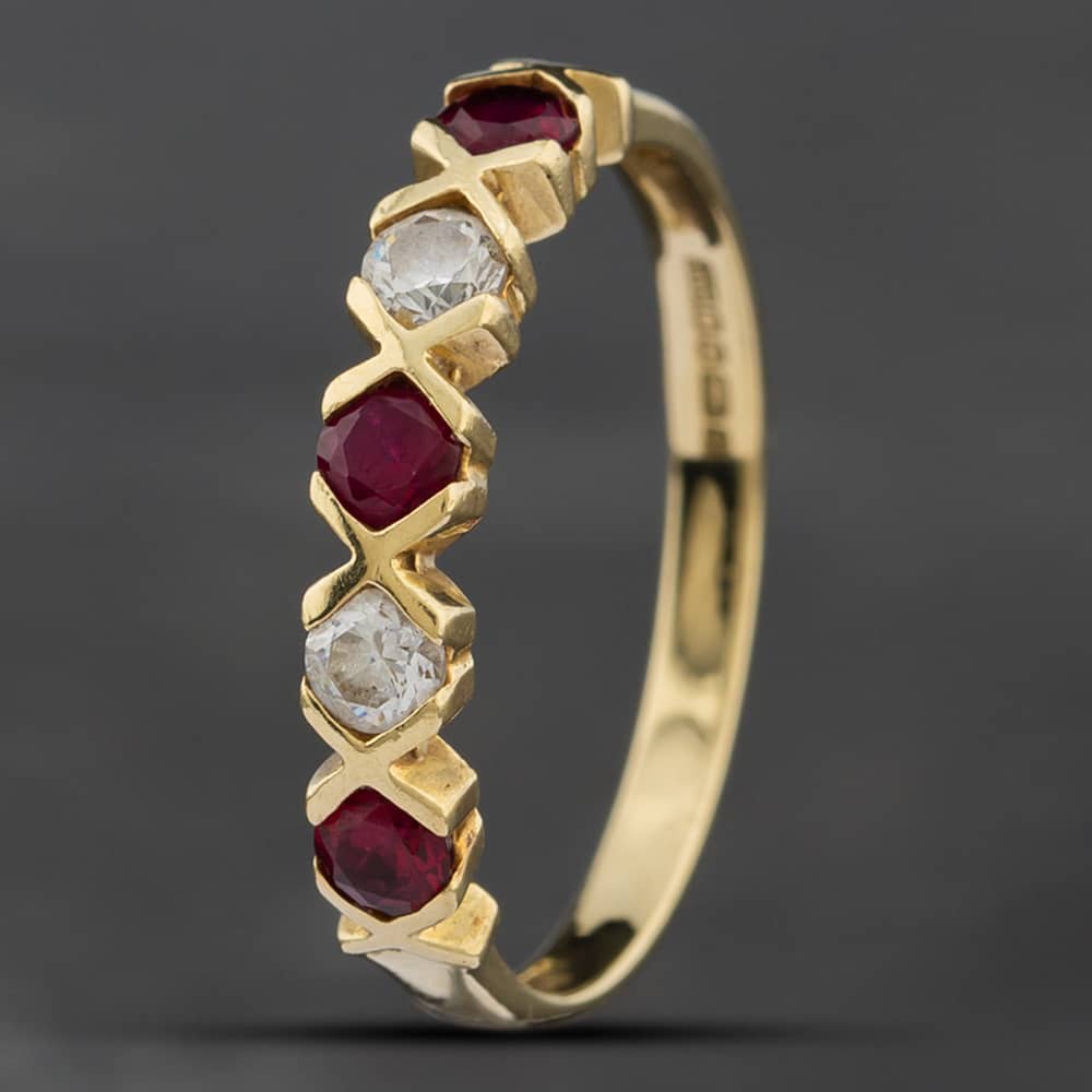 Product photograph of Pre-owned 14ct Yellow Gold Synthetic Stone Amp Cubic Zirconia Half Eternity Ring 41381907 from The Jewel Hut