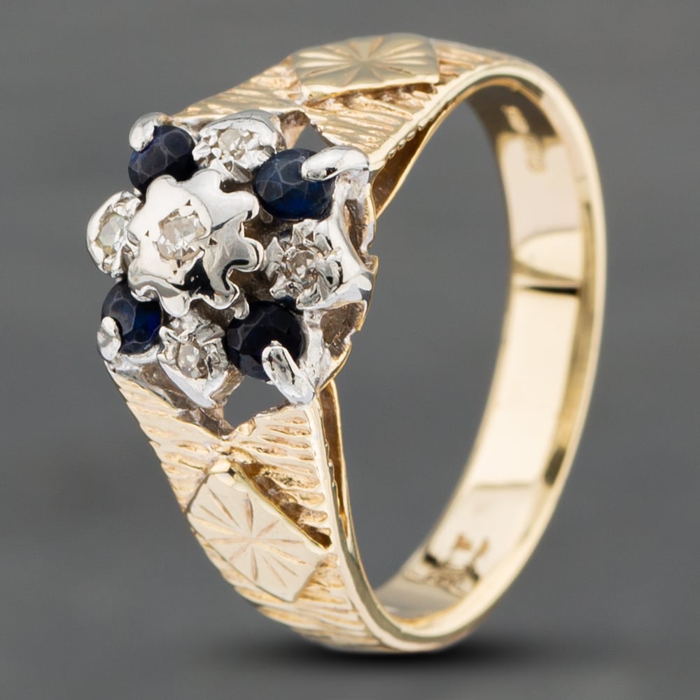 Product photograph of Pre-owned 9ct Yellow Gold Sapphire Amp Single Cut Diamond Cluster Ring 41382042 from The Jewel Hut
