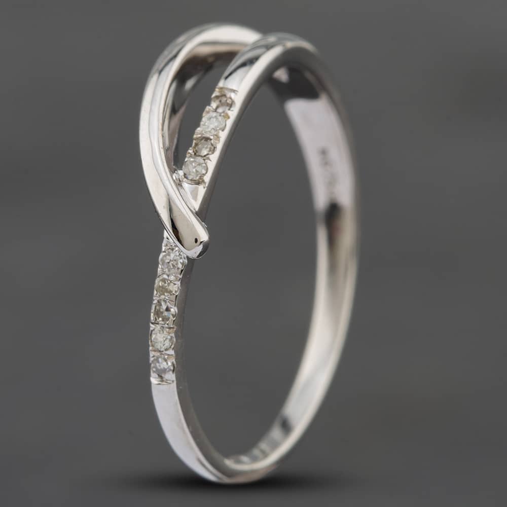 Product photograph of Pre-owned White Gold Single Cut Diamond Crossover Ring 41382060 from The Jewel Hut