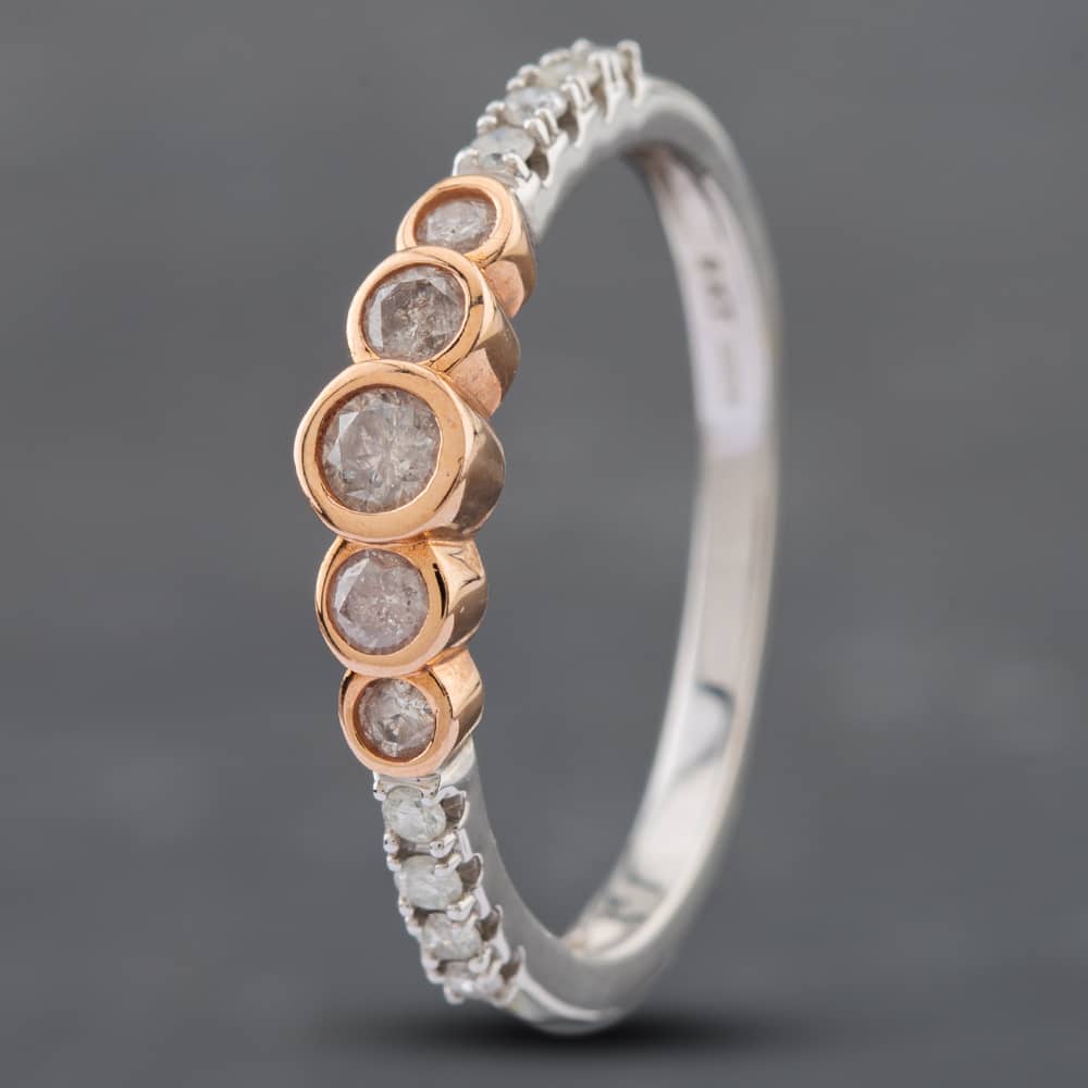 Product photograph of Pre-owned 9ct Two Colour Gold Brilliant Cut Diamond Graduating Shoulders Half Eternity Ring 41382164 from The Jewel Hut