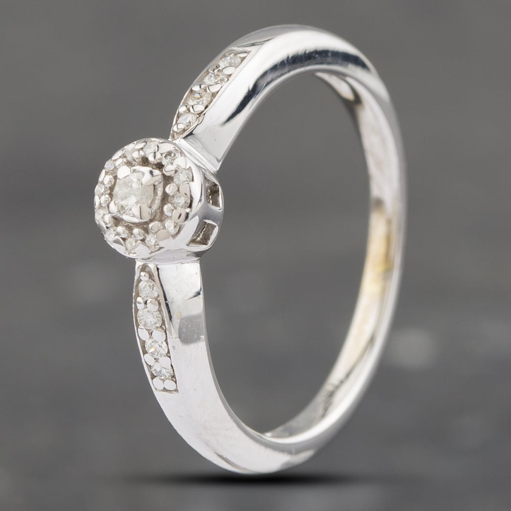 Product photograph of Pre-owned 9ct White Gold 0 10ct Brilliant Cut Diamond Halo Cluster Ring 41382187 from The Jewel Hut