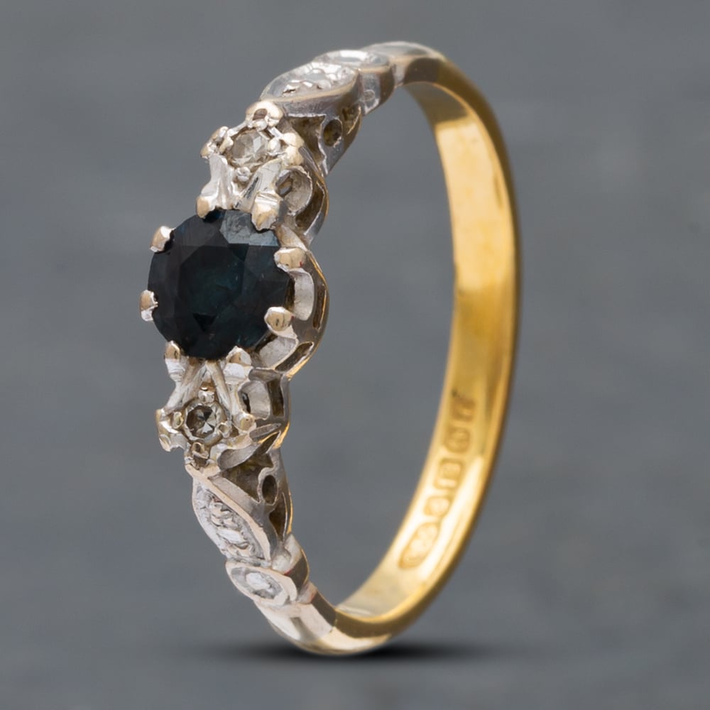 Product photograph of Pre-owned Vintage 18ct Yellow Gold Single Cut Sapphire Three Stone Ring 41382229 from The Jewel Hut