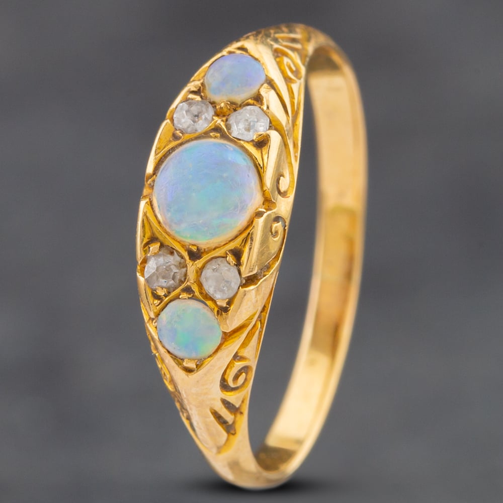 Product photograph of Pre-owned Yellow Gold Opal Amp Diamond Seven Stone Ring 41382279 from The Jewel Hut