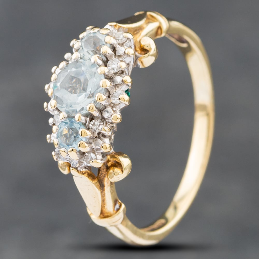 Product photograph of Pre-owned 9ct Yellow Gold Aquamarine Amp Diamond Cluster Ring 41382300 from The Jewel Hut