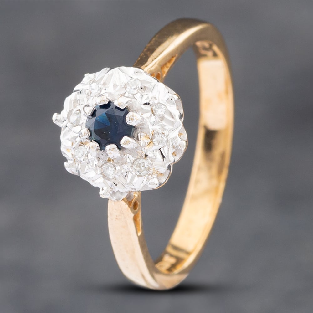 Product photograph of Pre-owned 9ct Yellow Gold Sapphire Amp Single Cut Diamond Round Cluster Ring 41382338 from The Jewel Hut