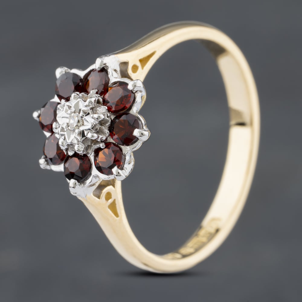 Click to view product details and reviews for Pre Owned Vintage 18ct Yellow Gold Garnet And Brilliant Cut Diamond Cluster Ring 41382346. Click to view product details and reviews for Pre Owned Vintage 18ct Yellow Gold Garnet And Brilliant Cut Diamond Cluster Ring 41382346.