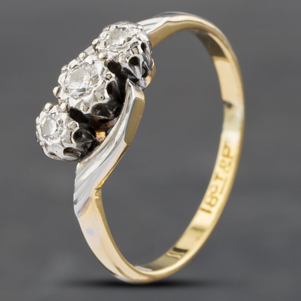 Product photograph of Pre-owned 9ct Yellow Gold Brilliant Cut Diamond Twist Three Stone Ring 41382367 from The Jewel Hut