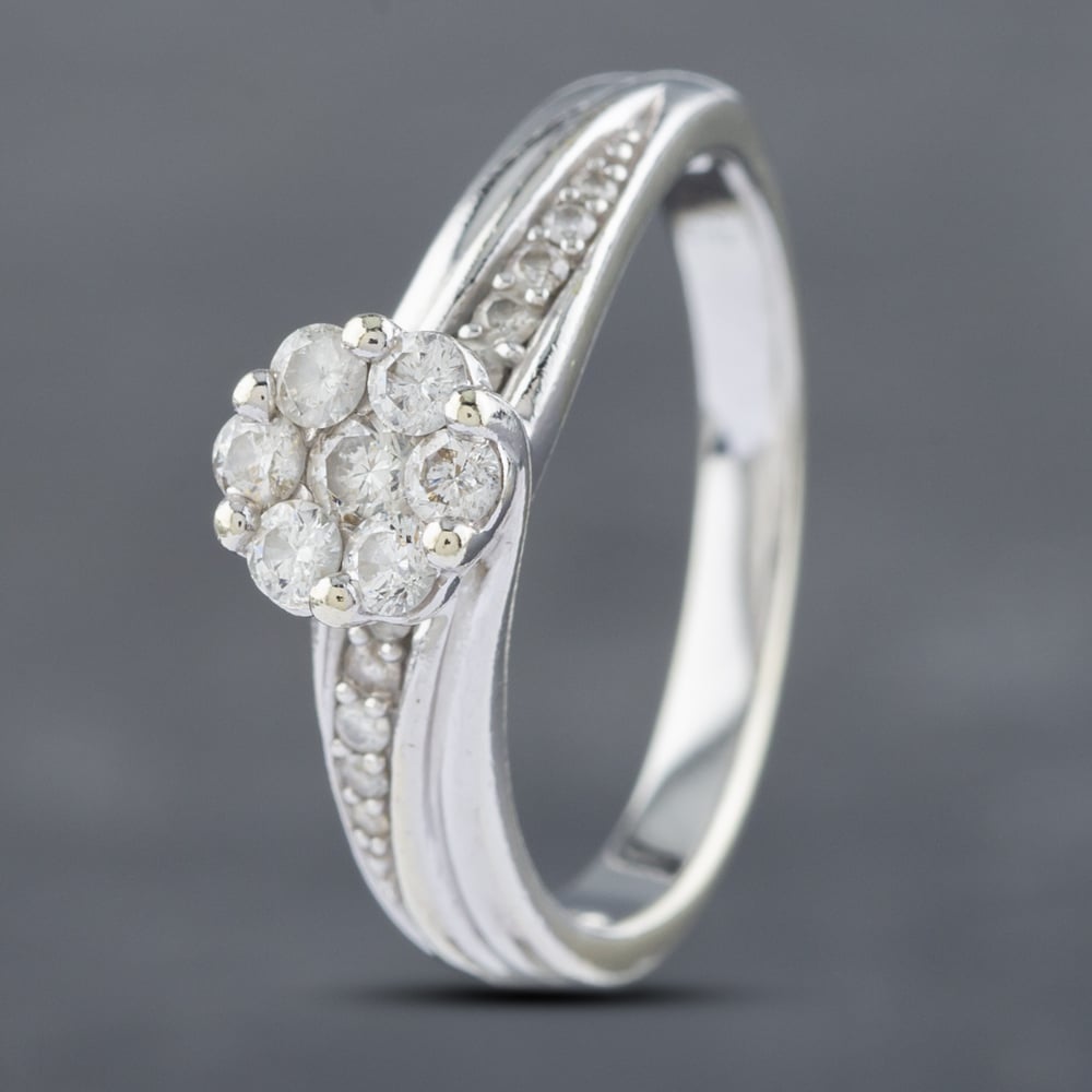 Click to view product details and reviews for Pre Owned 9ct White Gold 042ct Brilliant Cut Diamond Twist Cluster Ring 41382475. Click to view product details and reviews for Pre Owned 9ct White Gold 042ct Brilliant Cut Diamond Twist Cluster Ring 41382475.