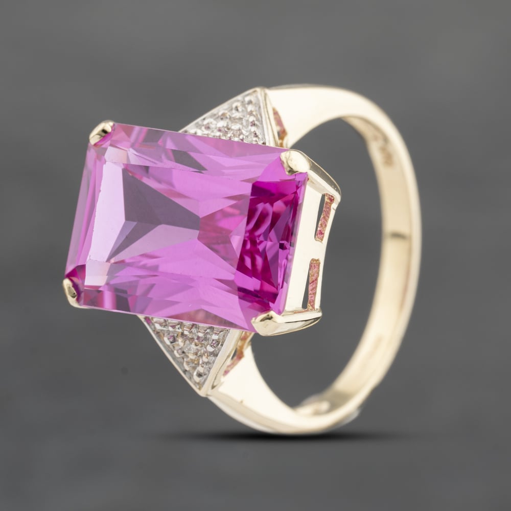 Click to view product details and reviews for Pre Owned 9ct Yellow Gold Synthetic Stone And Diamond Large Oblong Cluster Ring 41382713.