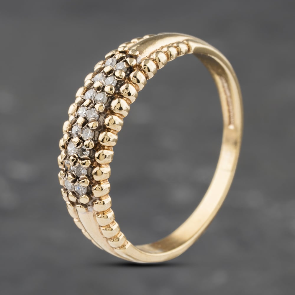 Click to view product details and reviews for Pre Owned 9ct Yellow Gold Diamond Graduated Band Two Row Ring 41383052.