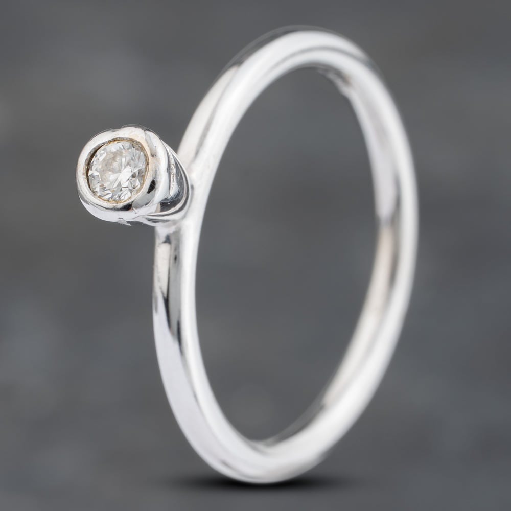 Click to view product details and reviews for Pre Owned 9ct White Gold 010ct Brilliant Cut Diamond Rubover Solitaire Ring 41383112. Click to view product details and reviews for Pre Owned 9ct White Gold 010ct Brilliant Cut Diamond Rubover Solitaire Ring 41383112.