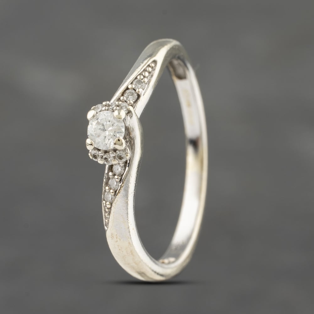 Click to view product details and reviews for Pre Owned 9ct White Gold 017ct Diamond Crossover Shoulder Set Solitaire Ring 41383179. Click to view product details and reviews for Pre Owned 9ct White Gold 017ct Diamond Crossover Shoulder Set Solitaire Ring 41383179.