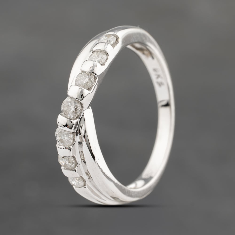 Click to view product details and reviews for Pre Owned 9ct White Gold 033ct Brilliant Cut Diamond Crossover Ring 41383261.