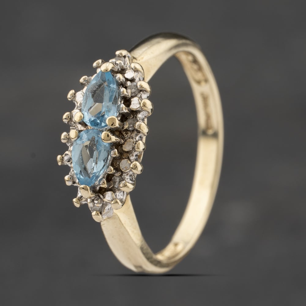 Click to view product details and reviews for Pre Owned 9ct Yellow Gold Blue Topaz And Diamond Cluster Ring 41383304. Click to view product details and reviews for Pre Owned 9ct Yellow Gold Blue Topaz And Diamond Cluster Ring 41383304.