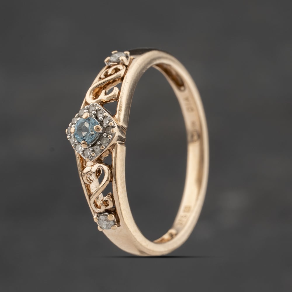 Click to view product details and reviews for Pre Owned 9ct Yellow Gold Blue Topaz And Diamond Cluster Ring 41383305. Click to view product details and reviews for Pre Owned 9ct Yellow Gold Blue Topaz And Diamond Cluster Ring 41383305.