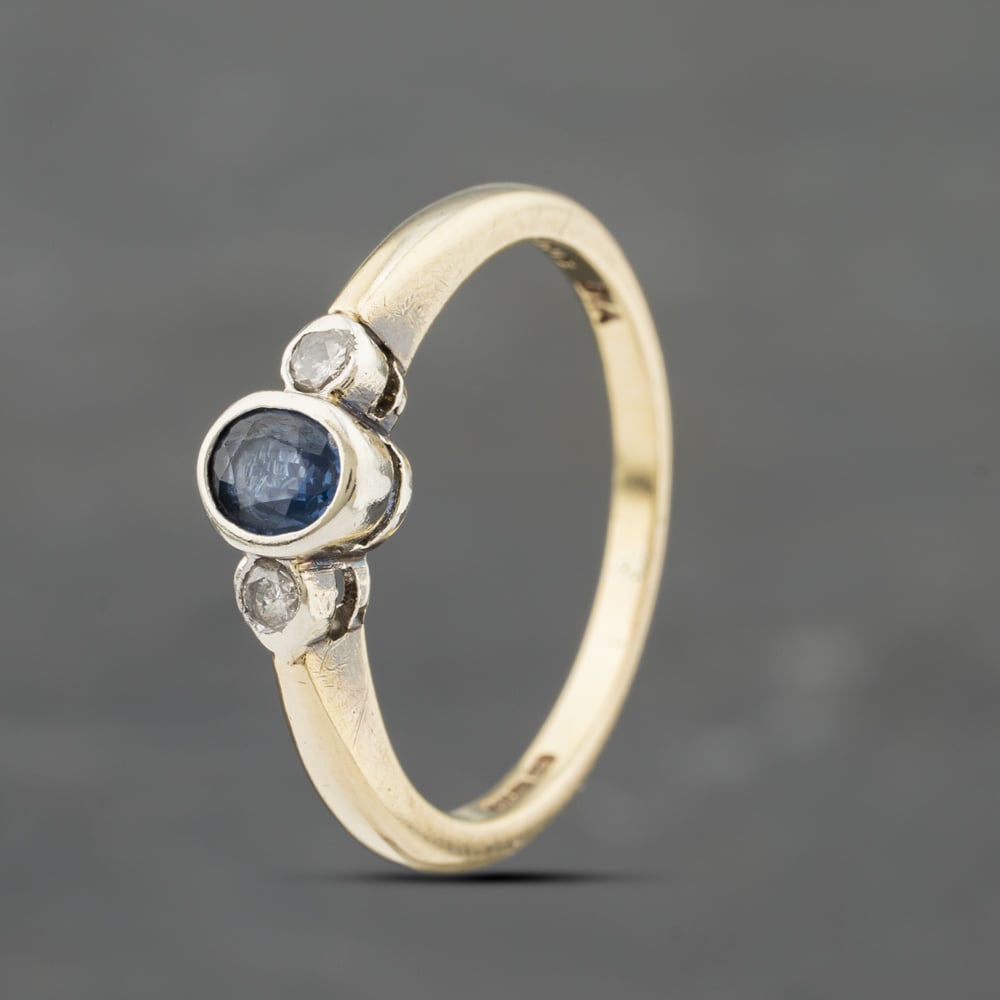 Click to view product details and reviews for Pre Owned 9ct Yellow Gold Sapphire And 010ct Diamond Rubover Three Stone Ring 41383359. Click to view product details and reviews for Pre Owned 9ct Yellow Gold Sapphire And 010ct Diamond Rubover Three Stone Ring 41383359.