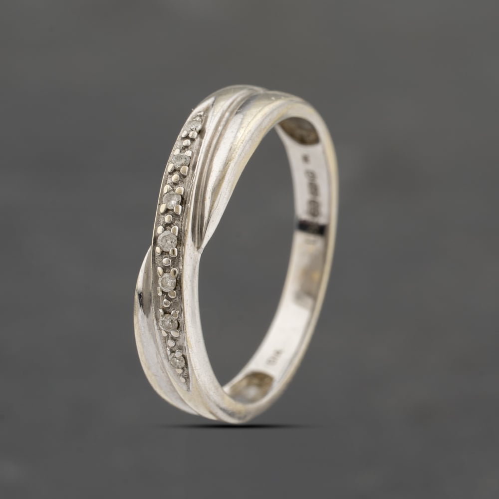 Click to view product details and reviews for Pre Owned 9ct White Gold Brilliant Cut Diamond Crossover Ring 41383380. Click to view product details and reviews for Pre Owned 9ct White Gold Brilliant Cut Diamond Crossover Ring 41383380.