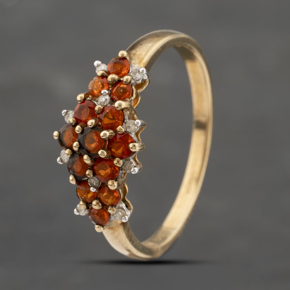 Click to view product details and reviews for Pre Owned 9ct Yellow Gold Garnet And 010ct Brilliant Cut Diamond Cluster Ring 41383422. Click to view product details and reviews for Pre Owned 9ct Yellow Gold Garnet And 010ct Brilliant Cut Diamond Cluster Ring 41383422.