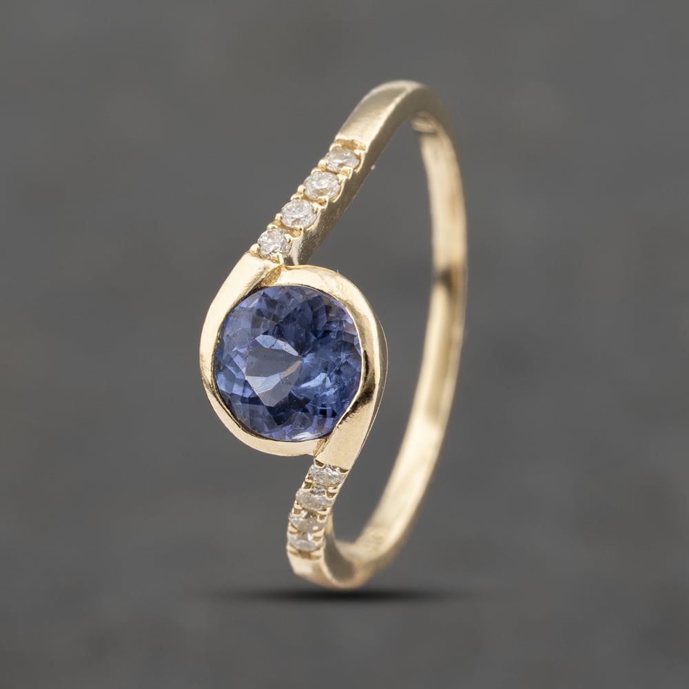 Click to view product details and reviews for Pre Owned 9ct Yellow Gold Tanzanite And 010ct Diamond Twist Dress Ring 41383444. Click to view product details and reviews for Pre Owned 9ct Yellow Gold Tanzanite And 010ct Diamond Twist Dress Ring 41383444.