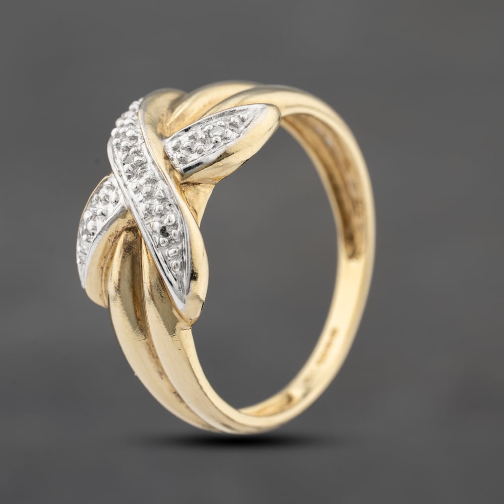 Click to view product details and reviews for Pre Owned 9ct Yellow Gold 002ct Diamond Crossover Dress Ring 41383518.