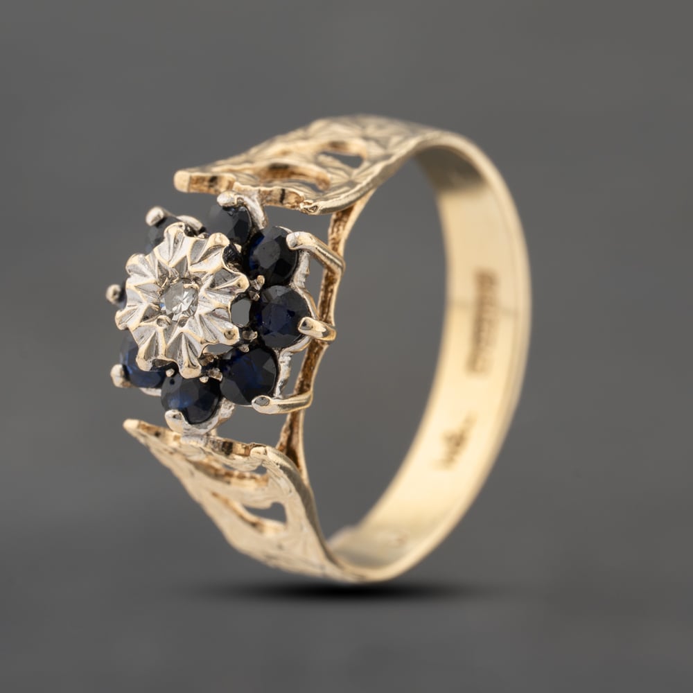 Click to view product details and reviews for Pre Owned 9ct Yellow Gold Sapphire And 003ct Diamond Flower Cluster Ring 41383537.