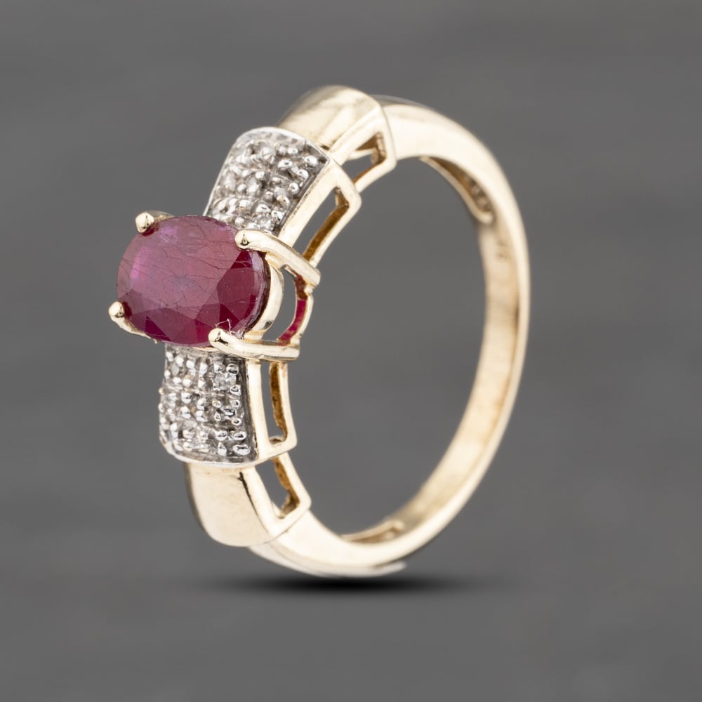 Click to view product details and reviews for Pre Owned 9ct Yellow Gold Ruby And 005ct Diamond Oval Pave Shoulders Dress Ring 41383587.