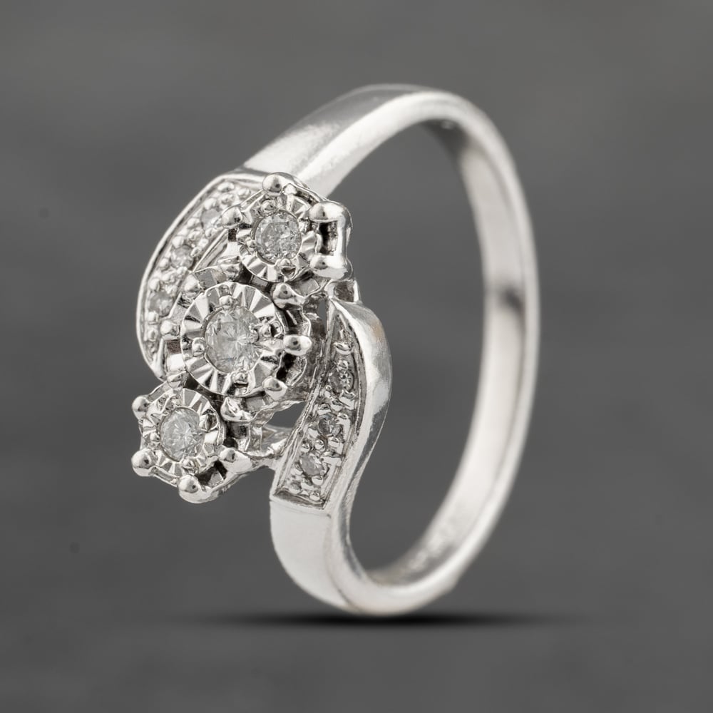 Click to view product details and reviews for Pre Owned 9ct White Gold 015ct Brilliant Cut Diamond Twist Three Stone Ring 41383648.