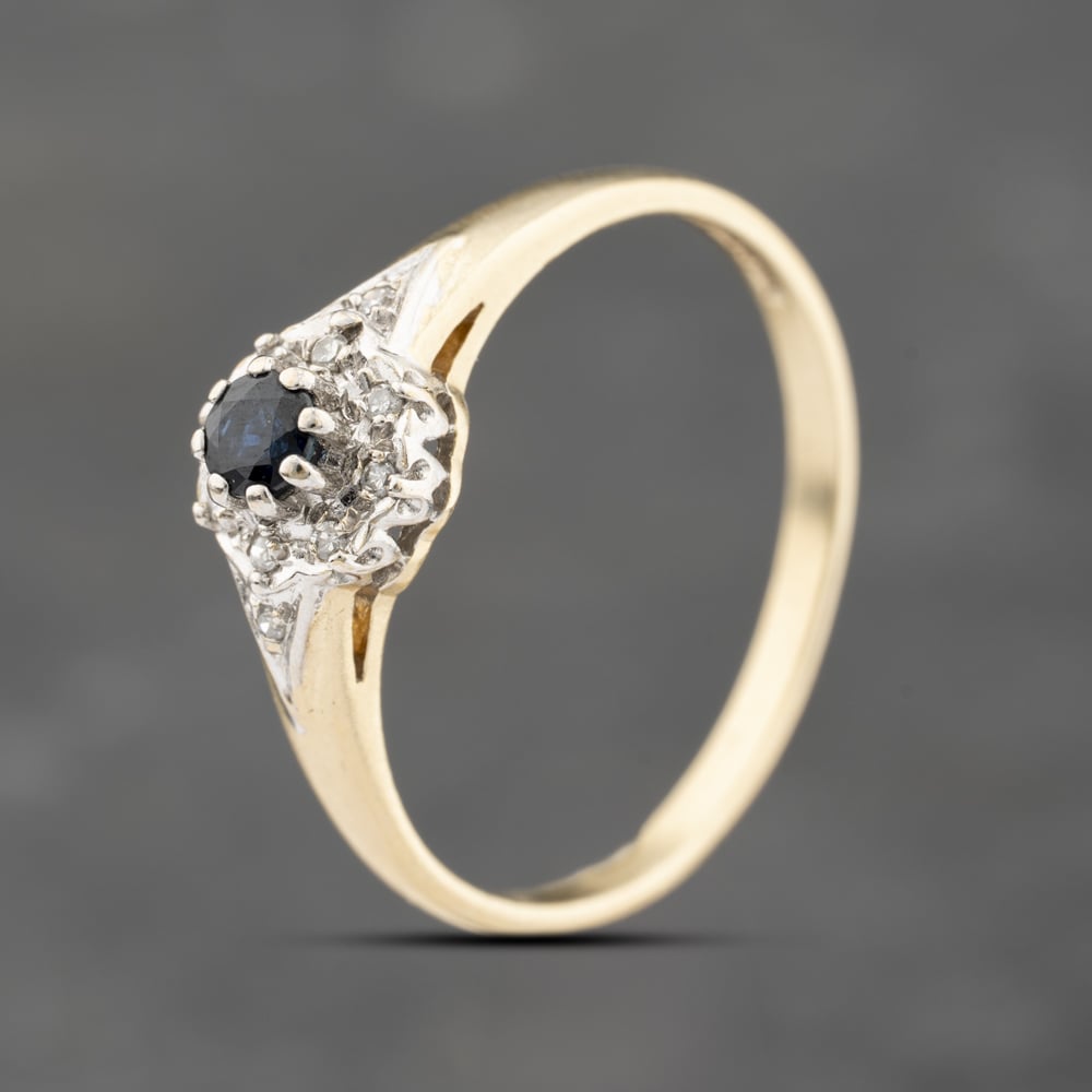 Click to view product details and reviews for Pre Owned 9ct Yellow Gold Diamond And 010ct Brilliant Cut Sapphire Cluster Ring 41383664.