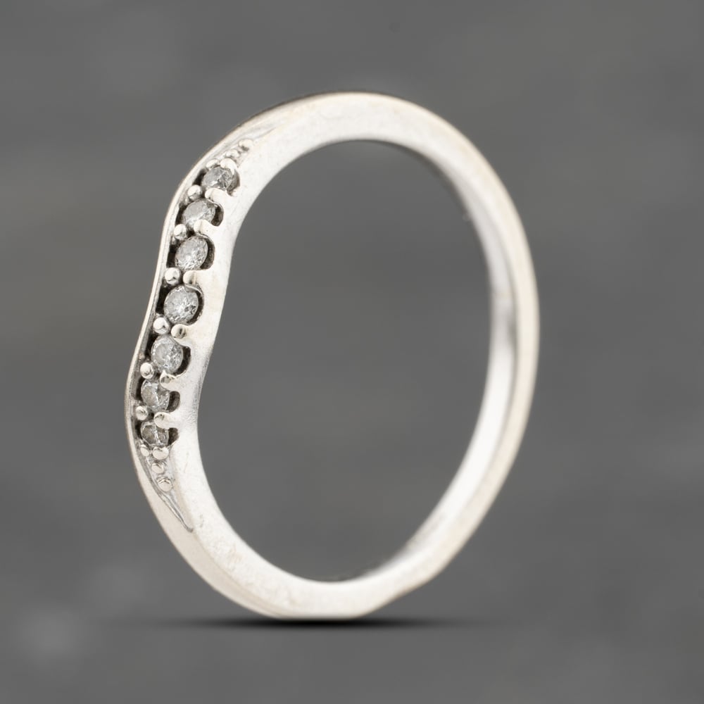 Click to view product details and reviews for Pre Owned 9ct White Gold 010ct Brilliant Cut Diamond Half Wishbone Ring 41383675.