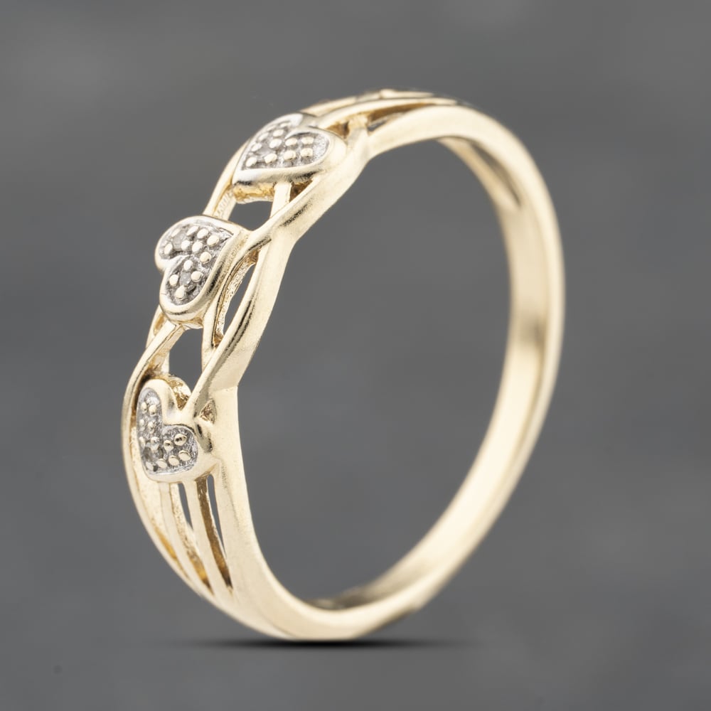 Click to view product details and reviews for Pre Owned 9ct Yellow Gold 002ct Diamond Triple Heart Dress Ring 41383684. Click to view product details and reviews for Pre Owned 9ct Yellow Gold 002ct Diamond Triple Heart Dress Ring 41383684.