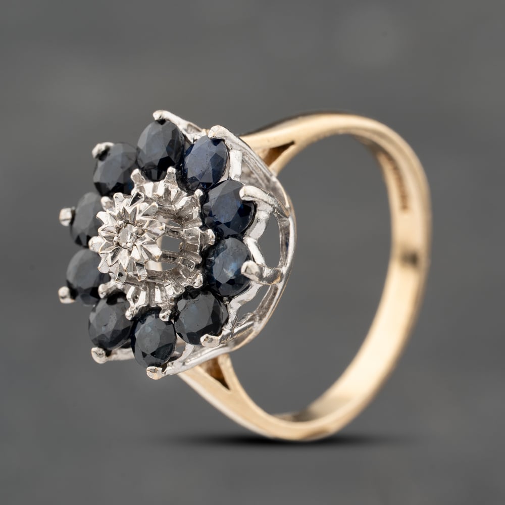 Click to view product details and reviews for Pre Owned 9ct Yellow Gold Sapphire And 010ct Brilliant Cut Diamond Flower Cluster Ring 41383764.