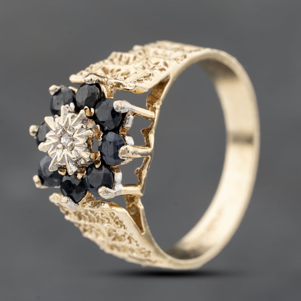 Click to view product details and reviews for Pre Owned 9ct Yellow Gold Sapphire And Diamond Flower Cluster Ring 41383805.