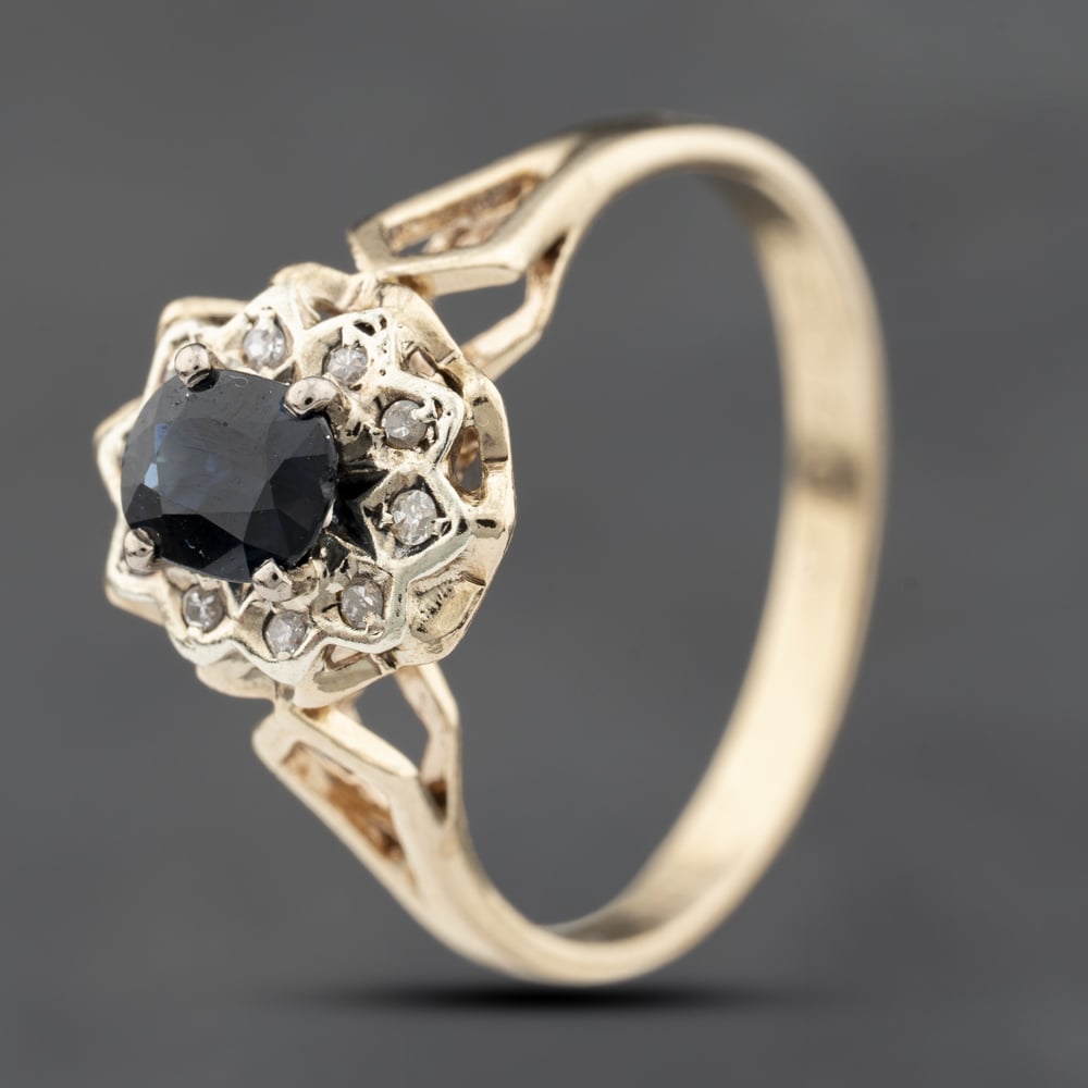Click to view product details and reviews for Pre Owned 9ct Yellow Gold Sapphire And Diamond Oval Cluster Ring 41383809.