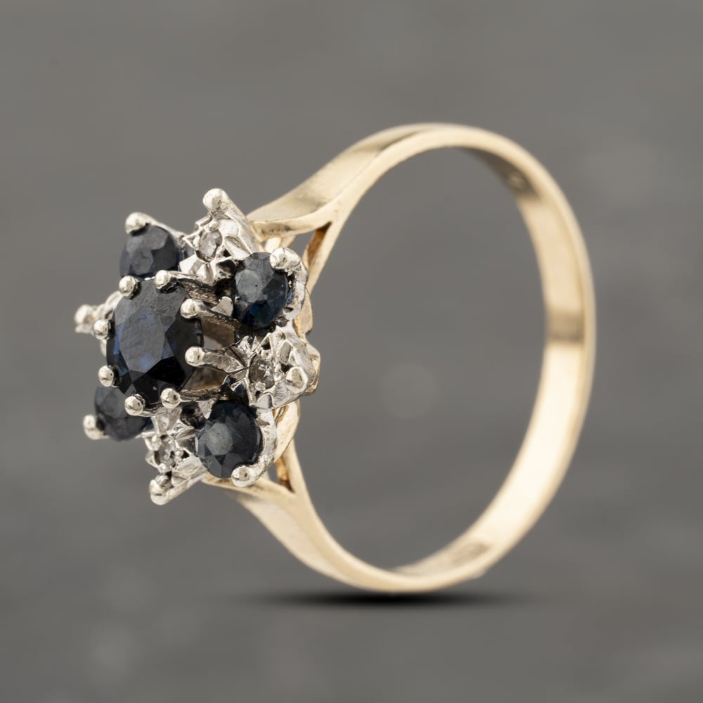 Click to view product details and reviews for Pre Owned 9ct Yellow Gold Sapphire And Diamond Flower Cluster Ring 41383901.