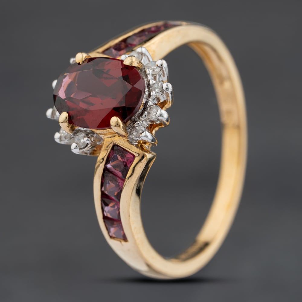 Click to view product details and reviews for Pre Owned 9ct Yellow Gold Garnet And 010ct Diamond And Pink Tourmaline Oval Twist Cluster Ring 41383922.