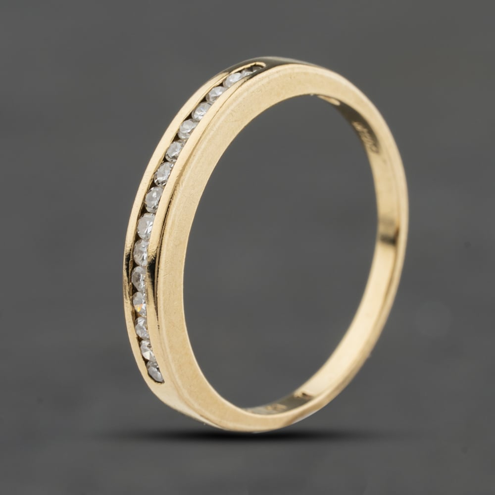 Click to view product details and reviews for Pre Owned 9ct Yellow Gold 015ct Diamond Channel Set Half Eternity Ring 41383970.