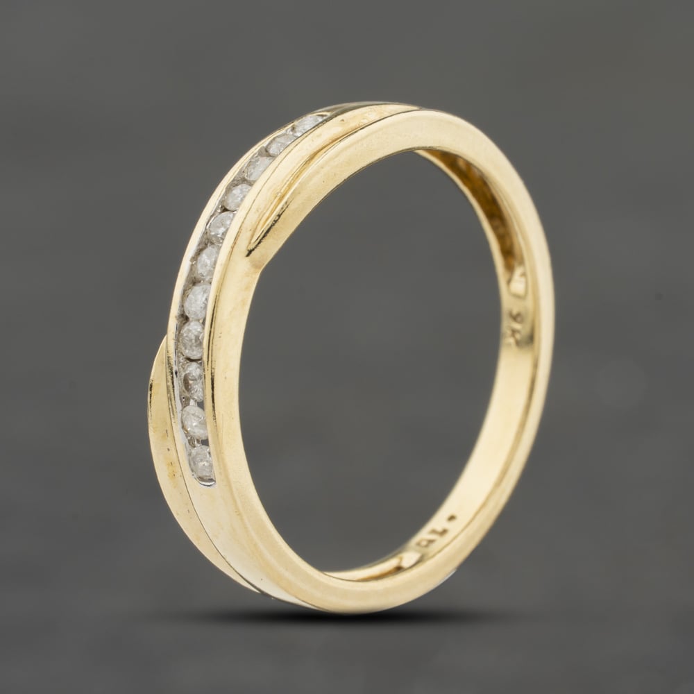 Click to view product details and reviews for Pre Owned 9ct Yellow Gold 015ct Brilliant Cut Diamond Channel Set Cossover Half Eternity Ring 41383971.