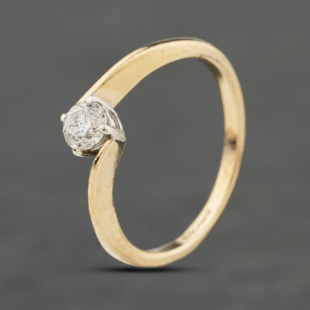 Click to view product details and reviews for Pre Owned 9ct Yellow Gold 025ct Brilliant Cut Diamond Four Claw Twist Solitaire Ring 41383989.