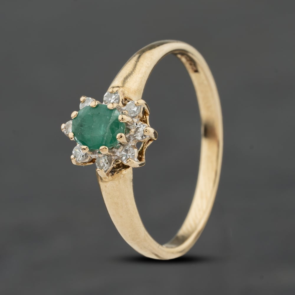Click to view product details and reviews for Pre Owned 9ct Yellow Gold Emerald And 010ct Brilliant Cut Diamond Flower Dress Ring 41384012.