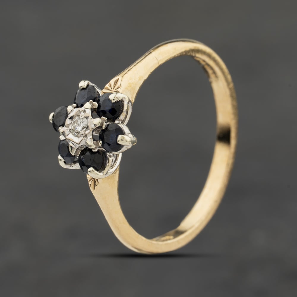 Click to view product details and reviews for Pre Owned 9ct Yellow Gold Sapphire And Diamond Flower Cluster Ring 41384032.